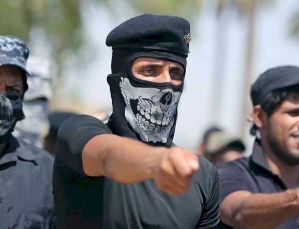 أكفان على منصات التواصل.. فصائل عراقية ترفع سقف التهديد وتلوّح بالانتحاريين في معركة الإسناد لإيران